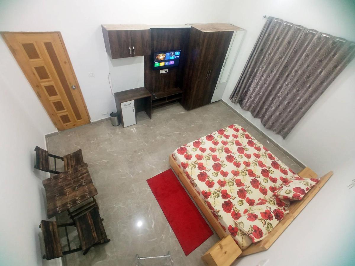 Travelodge Homestay Бір Екстер'єр фото